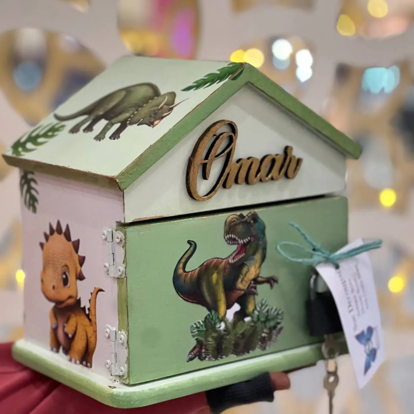 Personalized dinosaur-themed keepsake box for 'Omar'